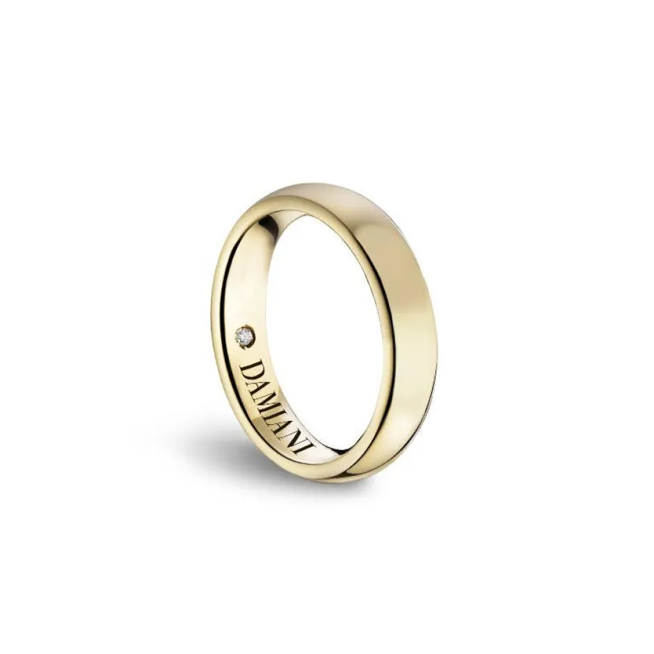 Damiani Fedi Nuziali>Fede nuziale in oro giallo con diamante, 2,70 mm.